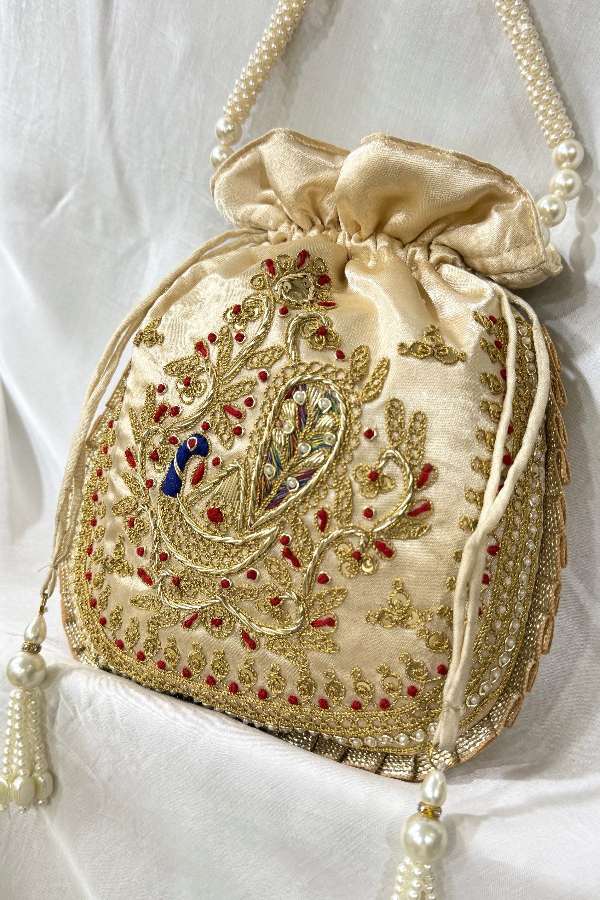 Marodi peacock handwork potli Bag -  Beige Color