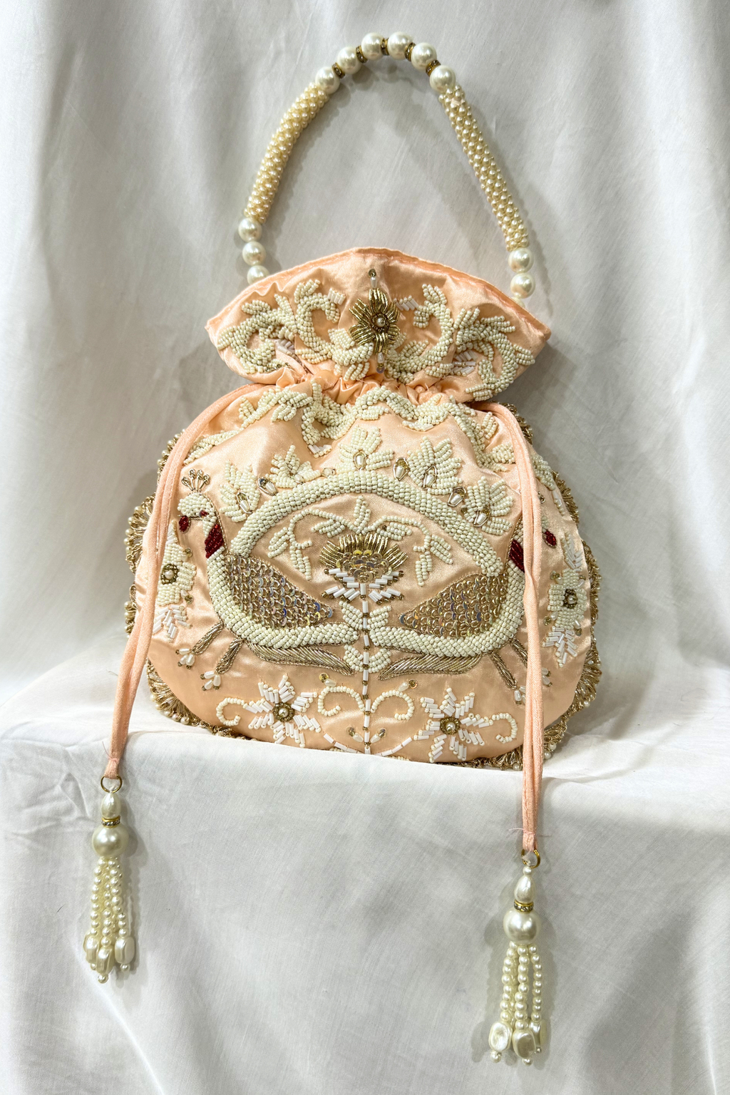 Jaco Pearl Peacock handwork potli Bag -  Peach