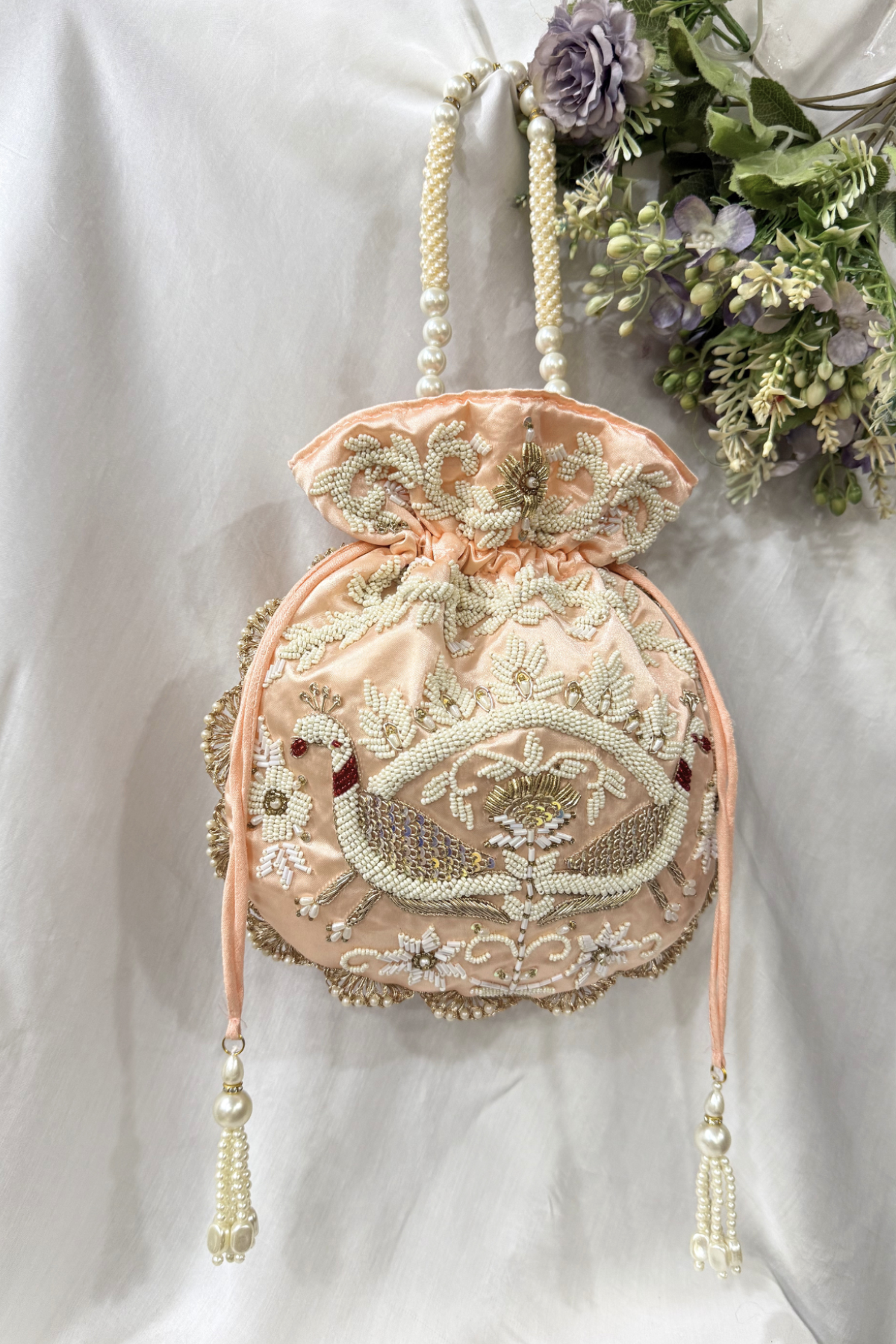 Jaco Pearl Peacock handwork potli Bag -  Peach