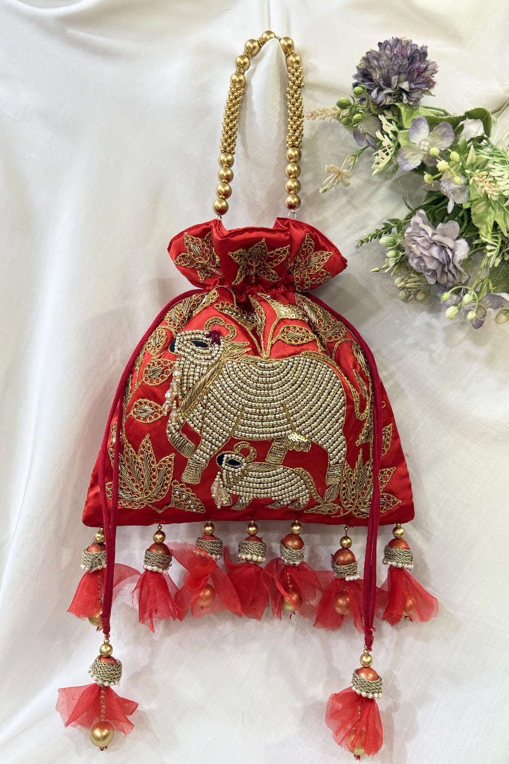 Pichwai Handwork Potli bag with beaded pearl handle - Red